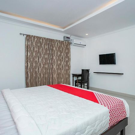 Отель Collection O Cosmopolitan Devanahalli Экстерьер фото