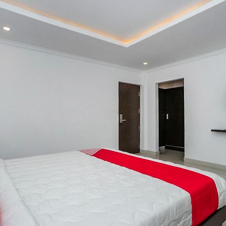 Отель Collection O Cosmopolitan Devanahalli Экстерьер фото