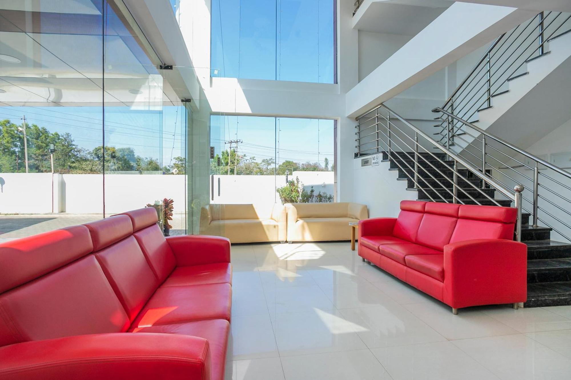 Отель Collection O Cosmopolitan Devanahalli Экстерьер фото